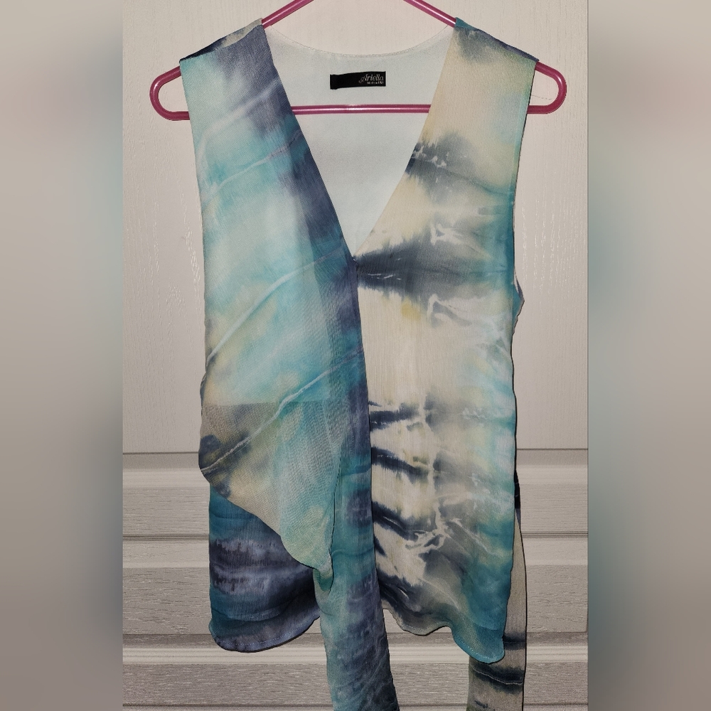 Blue and white sleeveless top